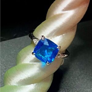 Bomb Party Blue Zircon on Rhodium Ring